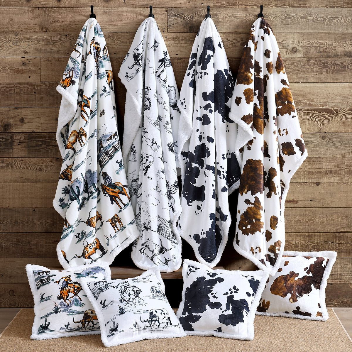 Country Campfire sherpa throws with farm, ranch and cowhide artwork