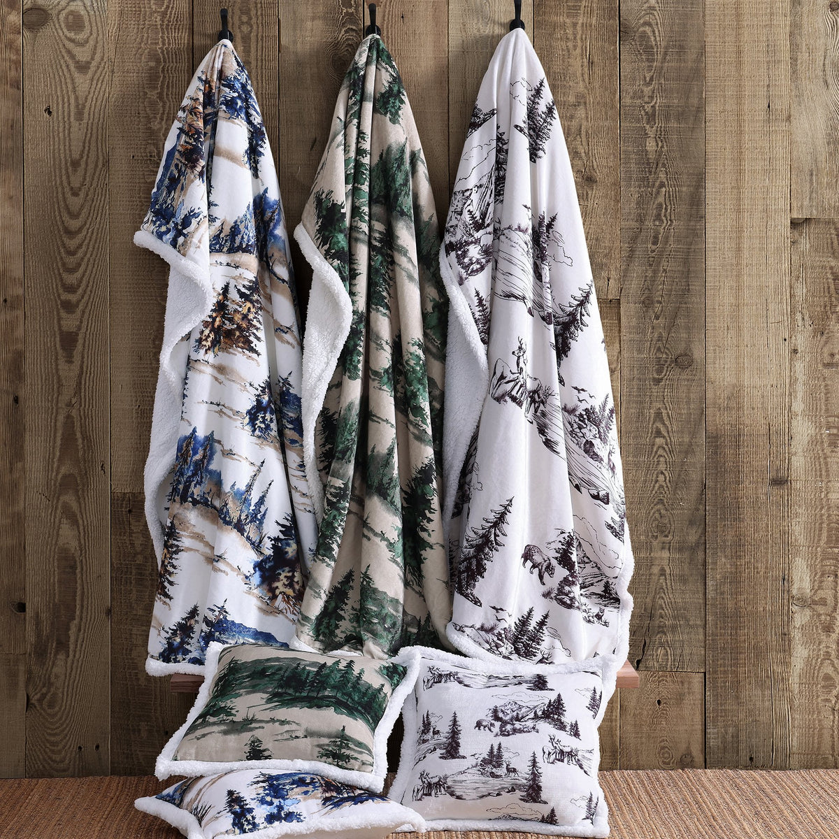 Lodge Campfire sherpa throws with forest and wildlife artwork