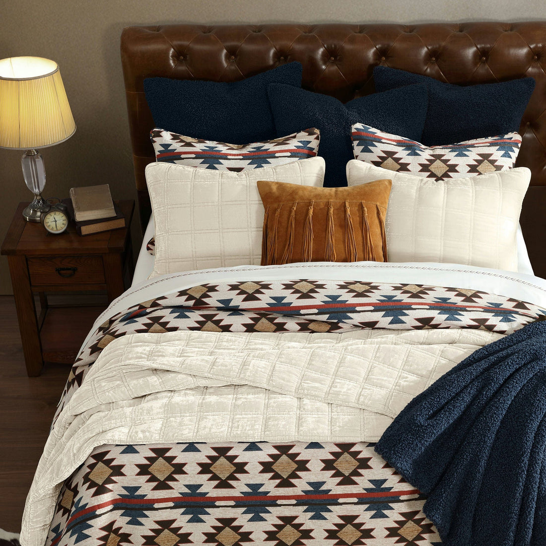 Mariella chenille bedding layered in a Western bedroom