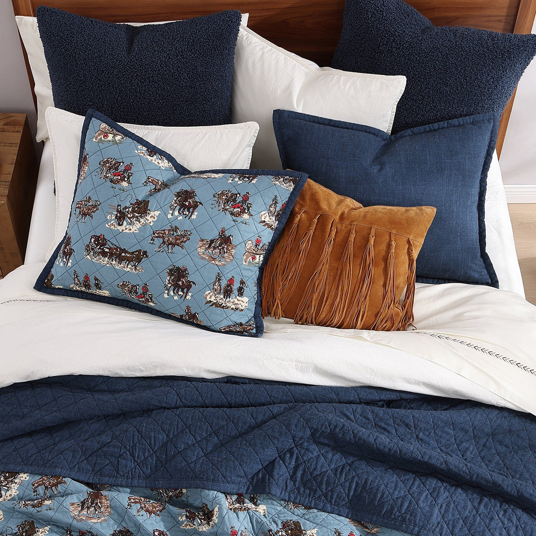Settler reversible quilt with pioneer scenes